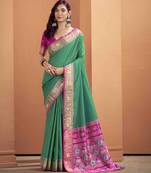 Women's dark green patola silk kalamkari saree with unstitched silk blouse piece