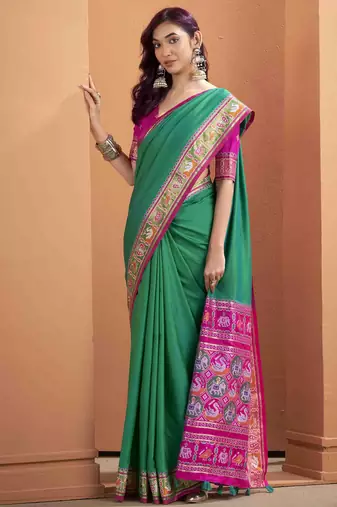 Women's dark green patola silk blend kalamkari saree with unstitched silk blend blouse piece