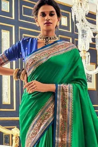 Women's dark green soft silk blend woven saree with unstitched silk blend blouse piece