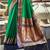 Women's dark green soft silk woven saree with unstitched silk blouse piece