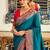 Women's teal soft silk woven saree with unstitched silk blouse piece