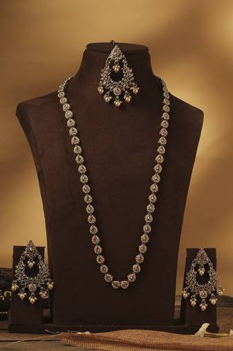 Paisley oval shape gold plated brown kundan stone long haram necklace set with maang tikka for women