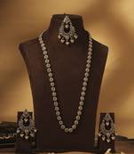 Paisley oval shape gold plated brown kundan stone long haram necklace set with maang tikka for women