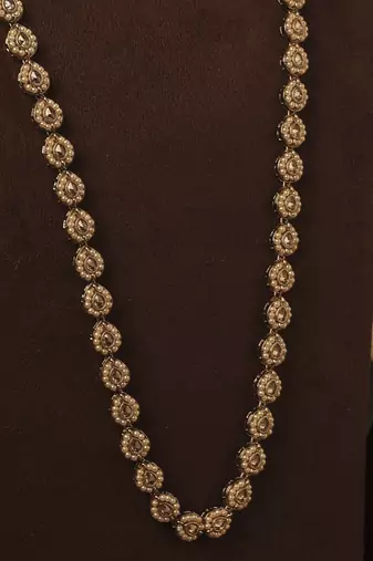 Paisley oval shape gold plated brown kundan stone long haram necklace set with maang tikka for women