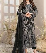 Black faux georgette semi stitched suit with embroidery work