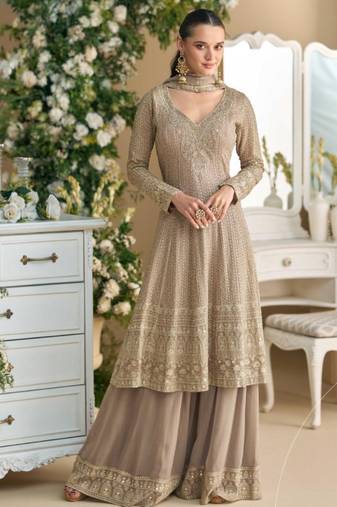 Beige heavy georgette free size stitched suit with sequence & diamond work