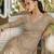 Beige heavy georgette free size stitched suit with sequence & diamond work