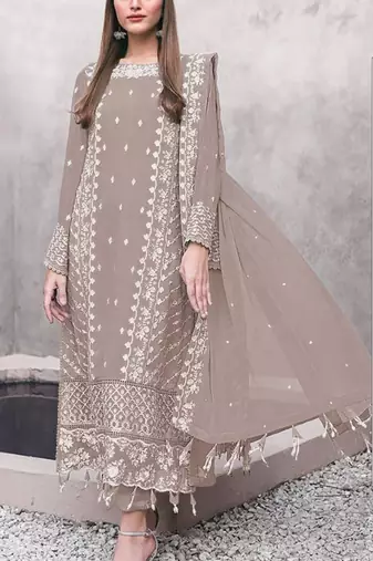 Beige faux georgette semi stitched suit with embroidery work