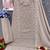Beige faux georgette semi stitched suit with embroidery work