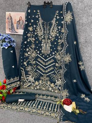 Teal embroidered faux georgette suit  3