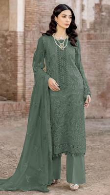 Green faux georgette suit with embroidery  1
