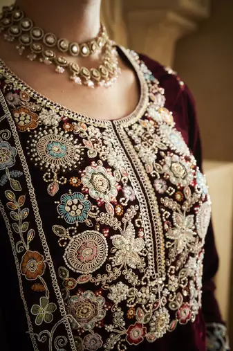 Purple embroderied velvet semi-stitched plazo suit