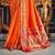 Women's orange soft silk woven saree with unstitched silk blouse piece