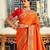 Women's orange soft silk woven saree with unstitched silk blouse piece