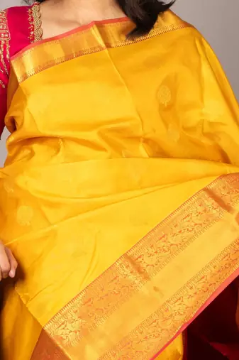 Yellow and pink pattu saree with blouse 