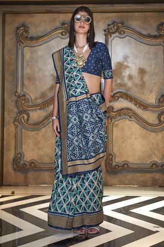 teal double ikat silk blend foil printed saree