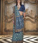 teal double ikat silk blend foil printed saree