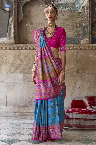 Silk blend aqua blue and pink patola print classic festival wear saree
