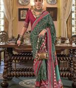 Dark green patola design zari work traditional silk blend saree