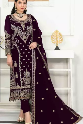 Purple velvet semi stitched suit with heavy embroidery & sequence work
