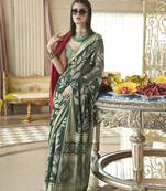 Georgette classic saree with fancy work for ceremonial in dark green
