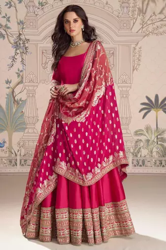 Rani pink embroidered , sequence , jacquard & embellished  work silk gown  - free size stitching (size upto 42")