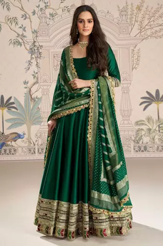 Green embroidered , sequence , jacquard & embellished  work silk gown  - free size stitching (size upto 42")