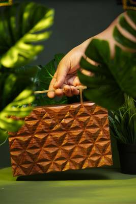 Handcarved geometric pattern handbag with rectangular handle 1