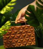 Handcarved geometric pattern handbag with rectangular handle