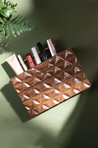 Handcarved geometric pattern handbag with rectangular handle