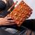 Handcarved geometric pattern handbag with dowel handle