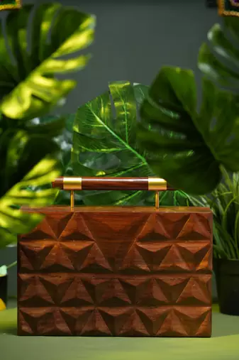 Handcarved geometric pattern handbag with dowel handle