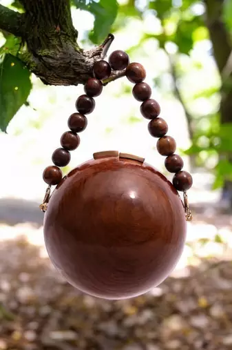 Wooden globe bag with beaded handle