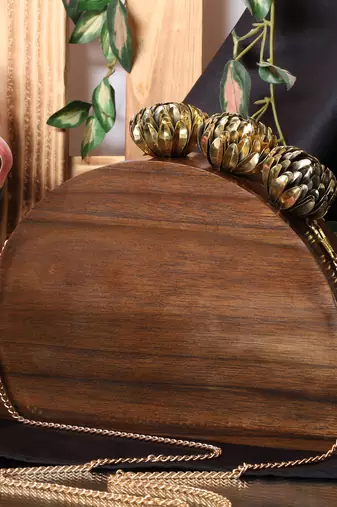 Semicircle wooden bag with designer brass clasp