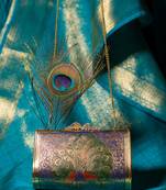 Ethnic peacock engraved brass clutch