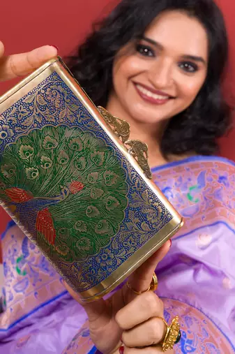 Ethnic peacock engraved brass clutch
