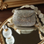 Glass mosiac brass bag in silver tone