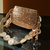 Glass mosiac brass bag in rose gold tone
