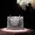 Hammered chic triangle brass bag in silver finish