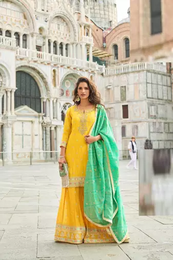 Yellow silk sharara with zari, sequin work & printed dupatta, free size stitching up to 42".