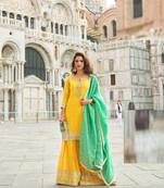 Yellow silk sharara with zari, sequin work & printed dupatta, free size stitching up to 42".