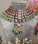 Gold plated green stone kundan necklace set