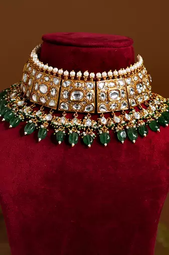 Gold plated green stone kundan necklace set