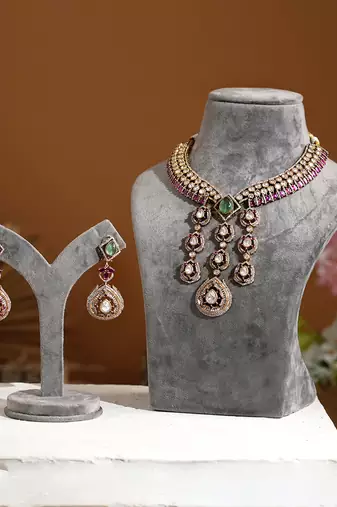 Gold plated purple stone kundan necklace set