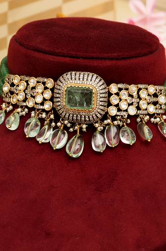 Gold plated green stone kundan necklace set