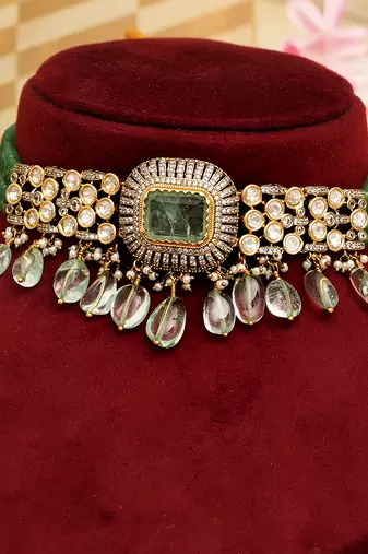 Gold plated green stone kundan necklace set