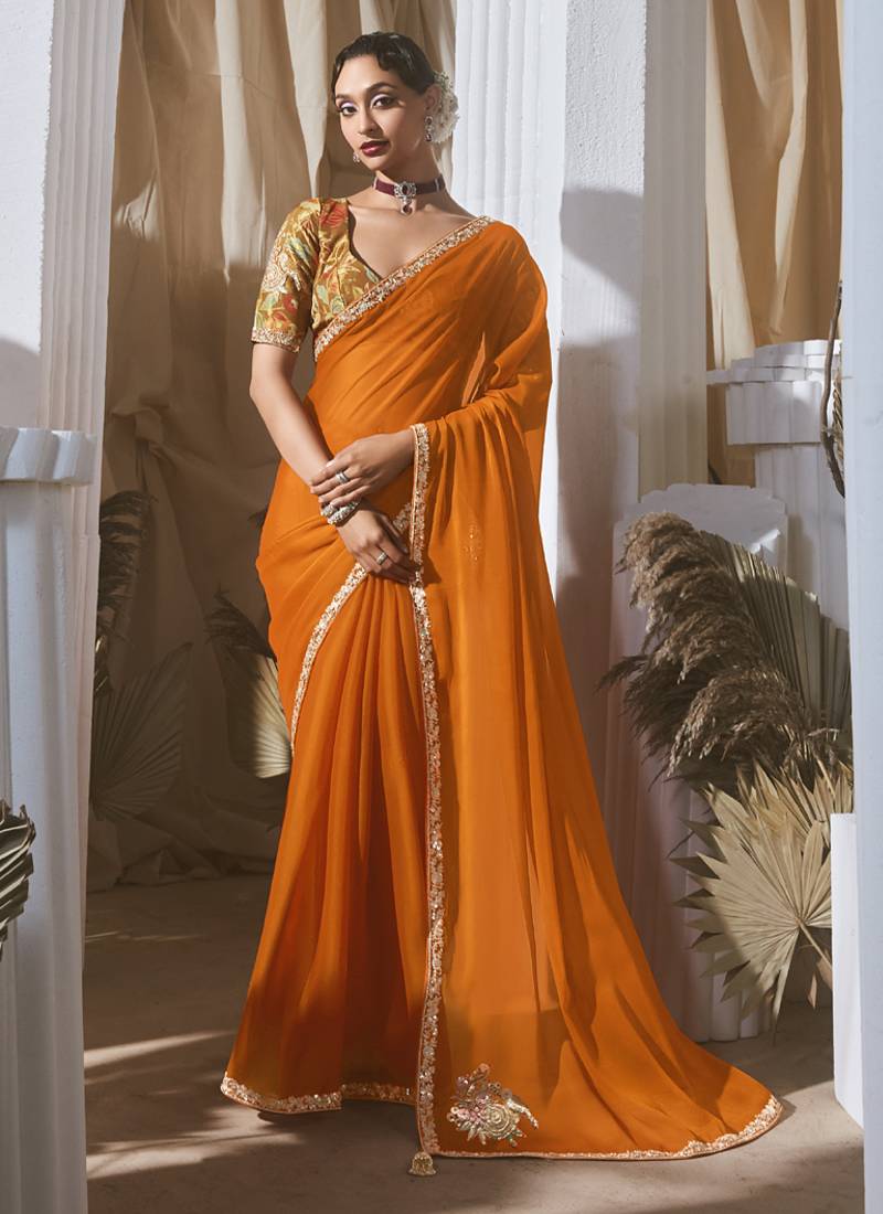 orange tissue silk blend sequince work designer border with tussel on pallu & digital printed blouse party wear saree