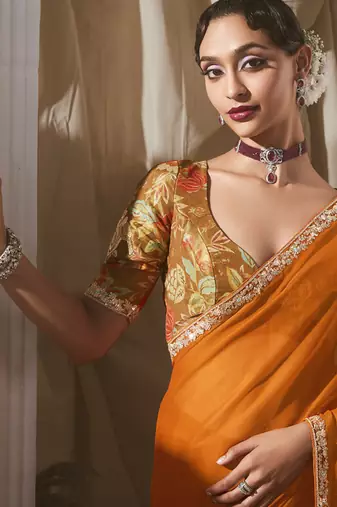 orange tissue silk blend sequince work designer border with tussel on pallu & digital printed blouse party wear saree
