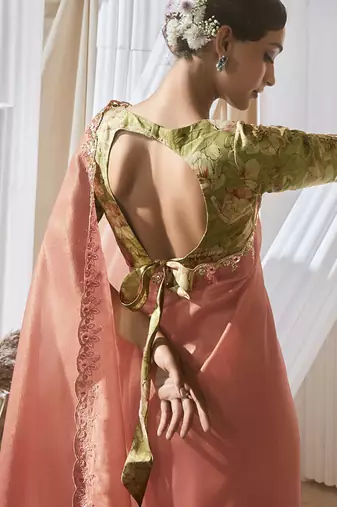salmon tissue silk blend sequince work designer border with tussel on pallu & digital printed blouse party wear saree