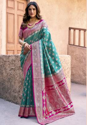 teal color elegant soft silk blend saree 1
